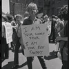 Donna Gottschalk holds "I am your worst fear I am your best fantasy" poster at Christopher Street Gay Liberation Day parade, 1970