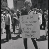 Donna Gottschalk holds "I am your worst fear I am your best fantasy" poster at Christopher Street Gay Liberation Day parade, 1970