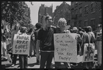 Donna Gottschalk (right) holds "I am your worst fear I am your best fantasy" poster at Christopher Street Gay Liberation Day parade, 1970