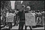 Donna Gottschalk (right) holds "I am your worst fear I am your best fantasy" poster at Christopher Street Gay Liberation Day parade, 1970
