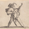 Le comédien masqué, avec lunettes, et jouant de la guitare