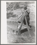 Prospector operating the papago, Pinos Altos, New Mexico