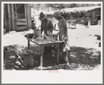 Doris and Faro Caudill fixing dinner, Pie Town, New Mexico