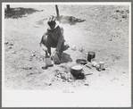 Faro Caudill making coffee for dinner the day he moved his dugout, Pie Town, New Mexico