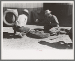 Changing tire at the garage, Pie Town, New Mexico