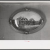 Picture of their farm home in Oklahoma. Hanging in living room of the George Huttons, Pie Town, New Mexico