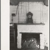 Fireplace and mantle in adobe home of homesteader, Pie Town, New Mexico