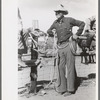 Cowboy at rodeo, Quemado, New Mexico