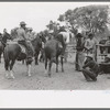 Cowboys on their horses at rodeo, Quemado, New Mexico