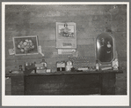 Decorations above mantelpiece in farm home near Merigold, Mississippi. Background photo for Sunflower Plantation