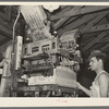 Lidding machine used in packing vegetables. Elsa, Texas