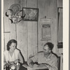 FSA client and wife noting farm income in ledger. Hidalgo County, Texas