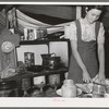 Kitchen table and stove of white migrant camp near Harlingen, Texas