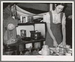 Kitchen table and stove of white migrant camp near Harlingen, Texas