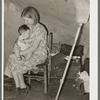 Migrant mother and child in tent home. Harlingen, Texas