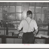 Weighing in truckload of sweet potatoes at starch plant. Laurel, Mississippi