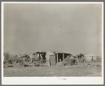 Outbuildings and housing in Mexican district. Robstown, Texas