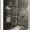 Mexican baby in swing bed in corral. Robstown, Texas