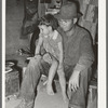 Migrant father and daughter in camp. Edinburg, Texas