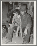 Migrant father and daughter in camp. Edinburg, Texas