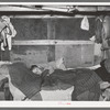 Sick child in bed in trailer home. Sebastian, Texas