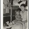Mother and child, white migrants, in trailer home near Edinburg, Texas