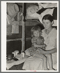 Mother and child, white migrants, in trailer home near Edinburg, Texas