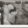 White migrant boy asleep in car. He came with his father from Houston to Edinburg, Texas
