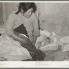 Mexican mother with three days old baby, born in this home. Crystal City, Texas