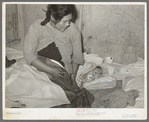 Mexican mother with three days old baby, born in this home. Crystal City, Texas