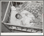 Mexican baby. This child is suffering from malnutrition. Notice the legs and arms. Crystal City, Texas