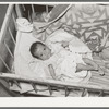 Mexican baby. This child is suffering from malnutrition. Notice the legs and arms. Crystal City, Texas