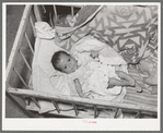 Mexican baby. This child is suffering from malnutrition. Notice the legs and arms. Crystal City, Texas