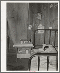 Tubercular Mexican in bed at home. Crystal City, Texas. Windows are tightly closed