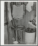 Washstand in corner of Mexican one-room dwelling. Crystal City, Texas