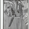 Basket and decorations on shelf of Mexican home. Crystal City, Texas