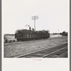 Loading scrap iron into railroad cars, Millville, Wisconsin