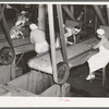 Girls removing foreign matter and inferior peas. Pea canning factory, Sun Prairie, Wisconsin