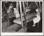 Girls removing foreign matter and inferior peas. Pea canning factory, Sun Prairie, Wisconsin