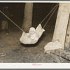 Indian baby in blueberry picker's camp, Littlefork, Minnesota