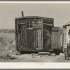 Tar paper dwelling occupied by family living in abandoned lumber cap, Gemmel, Minnesota