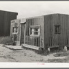 Dwelling on main street of Craigville, Minnesota. Lumbering "frontier" town