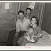Family and brother-in-law living in tarpaper shack in abandoned lumbercamp, Gemmel, Minnesota