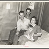 Family and brother-in-law living in tarpaper shack in abandoned lumbercamp, Gemmel, Minnesota