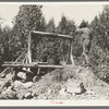 Old miner with his homemade windlass near Winton, Minnesota