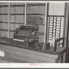 Cash register and empty shelves in closed store. Babbitt, Minnesota, "bust" iron mining town