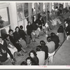 Mexican pecan workers waiting in union hall for assignment to work. San Antonio, Texas