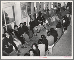 Mexican pecan workers waiting in union hall for assignment to work. San Antonio, Texas