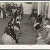 Mexican pecan workers waiting in union hall for assignment to work. San Antonio, Texas