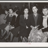 Mexican pecan workers waiting in union hall for assignment to work. San Antonio, Texas